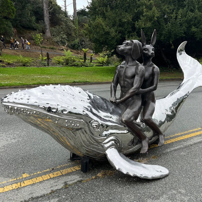Rabbitwoman and Dogman, statue lobbyists for wildlife conservation
